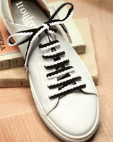 Lacets noir et blanc