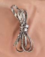 Lacets motif lézard argent