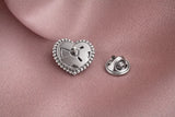 Bijou de bouton / pin's Nina Argent