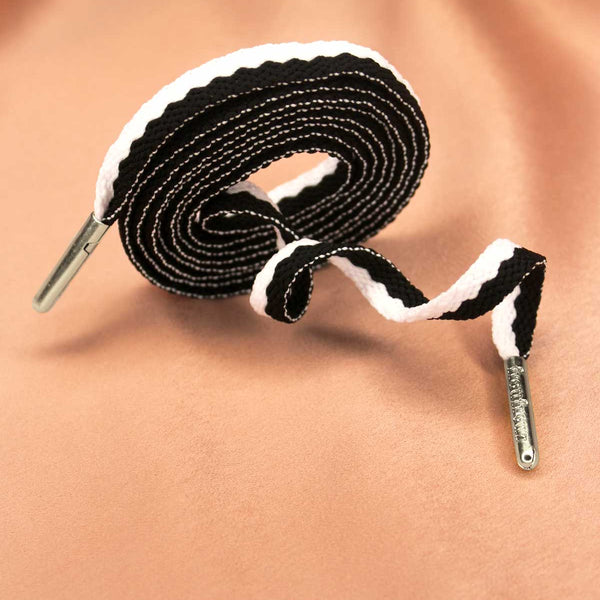 Basket blanche store lacet noir